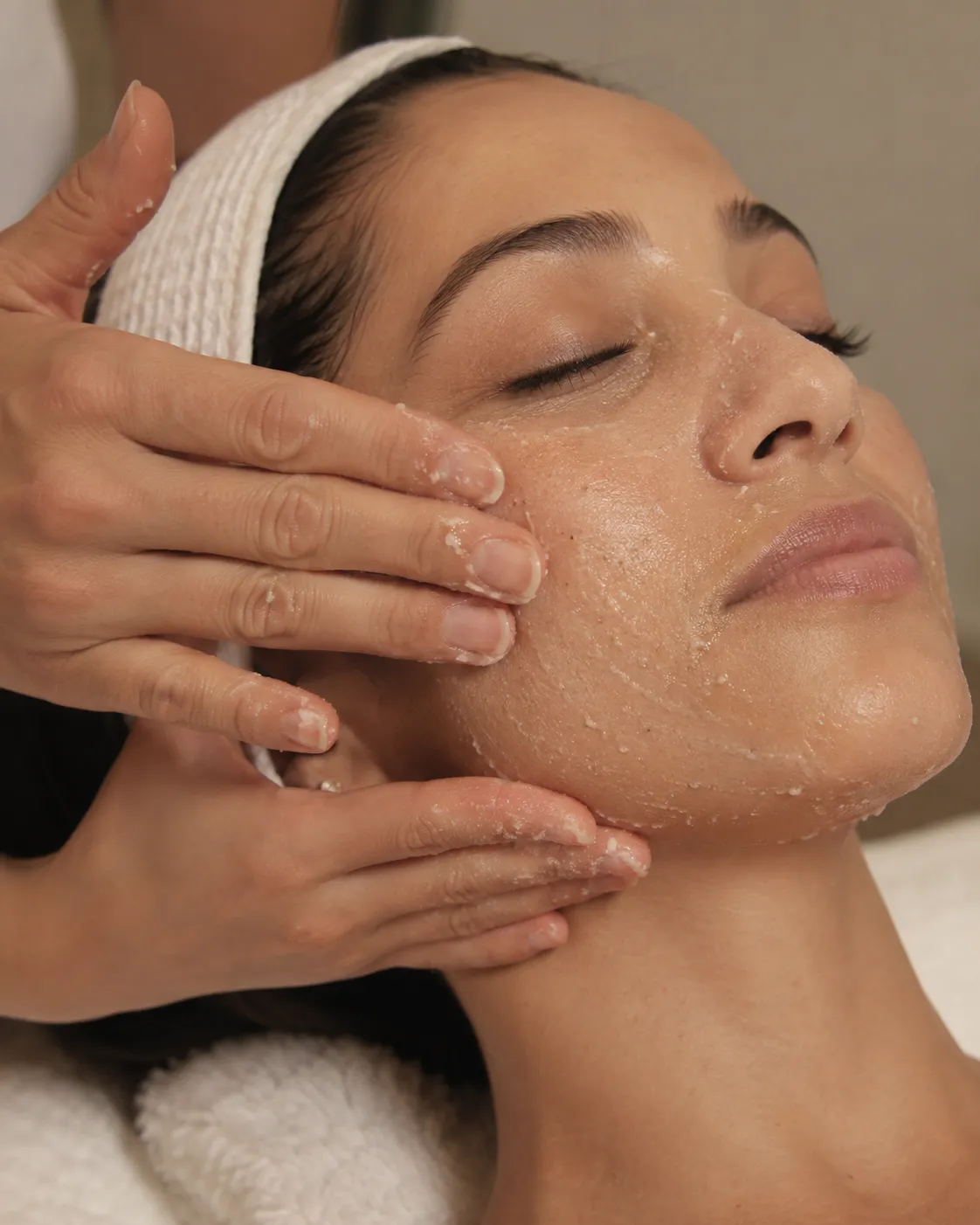 Face scrub being applied