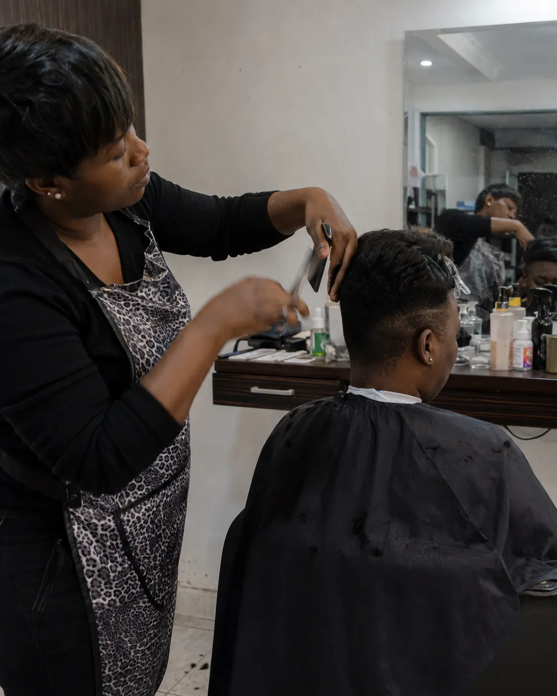 Haircut in progress at the studio